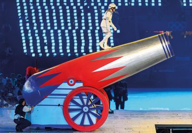 Person preparing to be fired from cannon