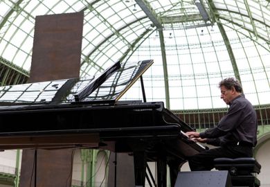 Philip Glass playing the piano