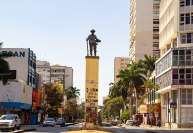 the statue that is right in the middle of Praça do Bandeirante in Goiania. Praça do Bandeirante em Goiânia. Bandeirante Square in Goiania. With the text "The government kills. Bolsonaro Out", painted