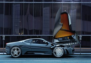 Grand piano falls on sports car Grand piano falls on sports car