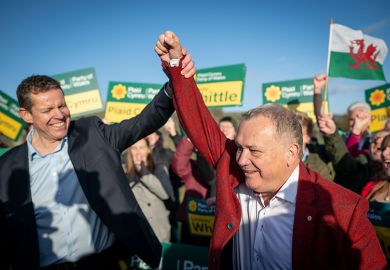 Lindsay Whittle (R), Plaid Cymru candidate for Caerphilly celebrates victory in the Caerphilly Senedd by-election with leader of Plaid Cymru Rhun ap Iorwerth (L) at Caerphilly Castle on 24 October, 2025 in Caerphilly, Wales.