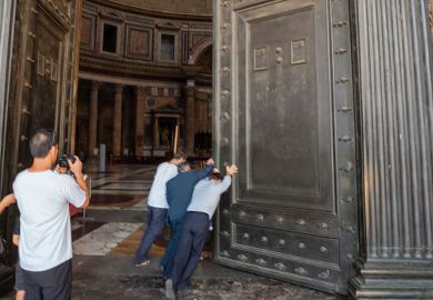 People pushing heavy door People pushing heavy door