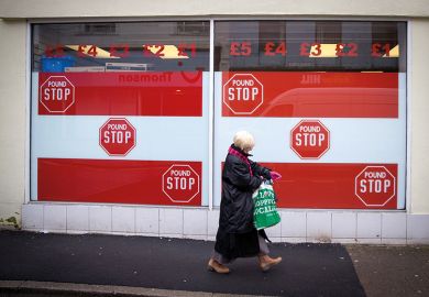A woman passes a shop front in Merthyr Tydfil, Wales, in 2016 A woman passes a shop front in Merthyr Tydfil, Wales, in 2016