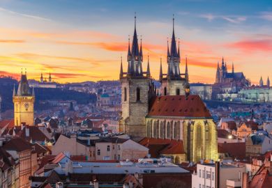 View over Church of Our Lady before Tyn, Old Town and Prague Castle at sunset