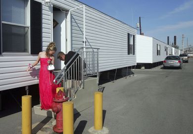 A couple leave a temporary trailer for their high school prom in Chalmette, Louisiana. To illustrate that universities in the USA may need to adapt for non-traditional students in order to tackle the enrolment cliff.