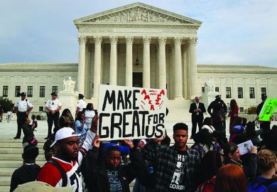 DC area students protest the election of President-elect Donald Trump, in front of the US Supreme Court