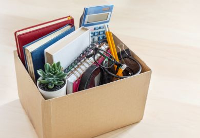A cardboard box containing a quitting worker's belongings