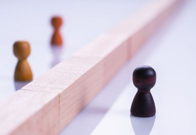 Black and white chess pieces, symbolising racism