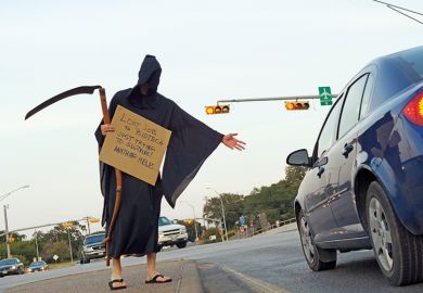 Person dressed as Grim Reaper