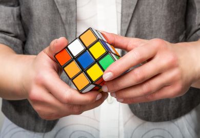 Rubik's Cube puzzle illustrating article about changes to students loans system in the UK