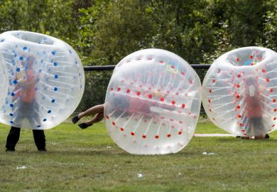 Saint John, New Brunswick, Canada - August 26, 2017 Events at the Dragon Boat Festival. People play bubble soccer.