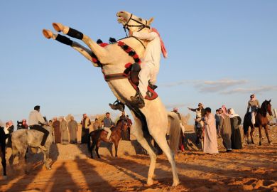 Saudi man riding horse, Tabuk, Saudi Arabia Saudi man riding horse, Tabuk, Saudi Arabia