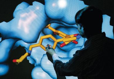 Scientist Nathan Brown moves 3D model of HSP90 protein Scientist Nathan Brown moves 3D model of HSP90 protein
