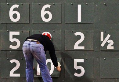 A scoreboard worker changes the scores, to illustrate a new online tool that seeks to correct biases in student evaluations.