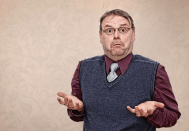 Man shrugging shoulders cropped