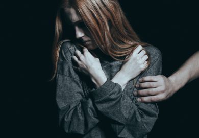 A man grabs a defensive woman A man grabs a defensive woman, illustrating sexual assault