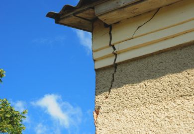 A cracked building, illustrating low standards