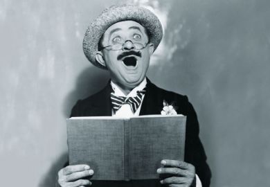 Man holding book and singing