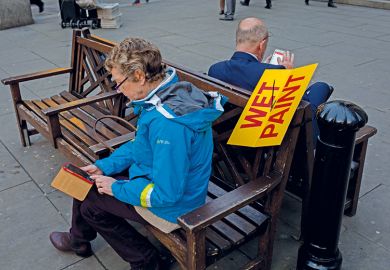Sitting on wet paint bench