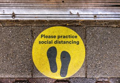 a social distancing sign