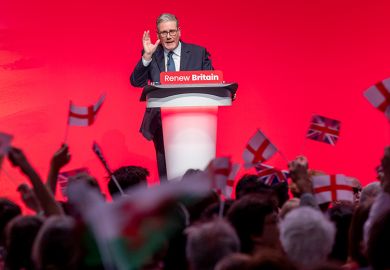 Delegates wave flags as Sir Keir Starmer, the British Prime Minister and leader of the Labour Party delivers his speech to several standing ovations at the 2025 Labour Party Conference on the 30 September 2025 in Liverpool, United Kingdom.