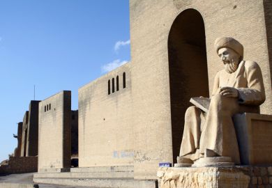 Statue of Kurdish poet outside Citadel of Erbil