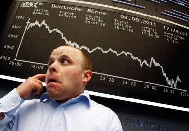 Trader reacts to DAX index board, Frankfurt stock exchange