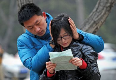 Student reads before National Entrance Examination for Postgraduate (NEEP)