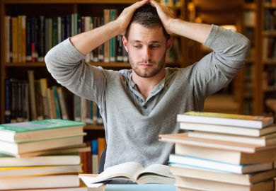 A tired student in the library
