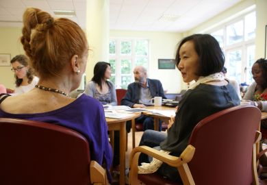 Volunteers with elderly people