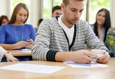 Student on phone in class