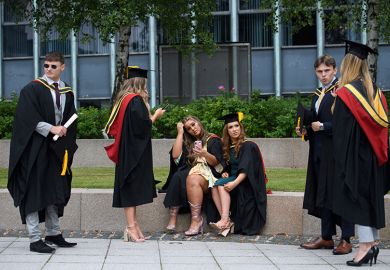 Students relax on campus at the University of Bolton after receiving their degree certificates. Some of them look uncertain. To illustrate that a “challenging” graduate labour market in the UK could erode trust in the higher education sector. Students relax on campus at the University of Bolton after receiving their degree certificates. Some of them look uncertain. To illustrate that a “challenging” graduate labour market in the UK could erode trust in the higher education sector.