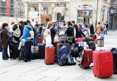 Students waiting for bus, Plaza del Poeta Iglesias, Salamanca, Spain Students waiting for bus, Plaza del Poeta Iglesias, Salamanca, Spain