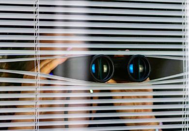  A woman peeking through blinds while holding binoculars, illustrating suspicion