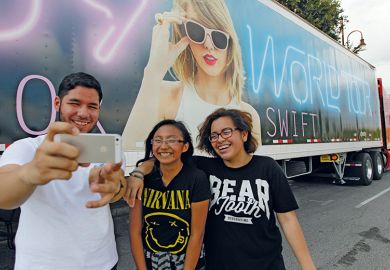 Taylor Swift fans in Houston Taylor Swift fans in front of one of the many semi-trucks in Houston to illustrate For Taylor Swift, lecturers find a place in this world
