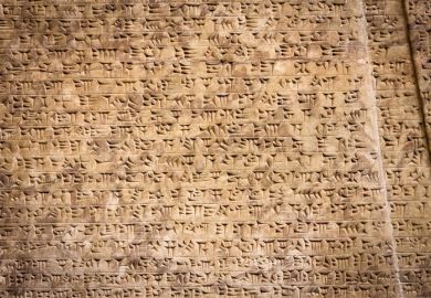 Ancient cuneiform writing illustrating an opinion article about the value and purpose of university syllabi