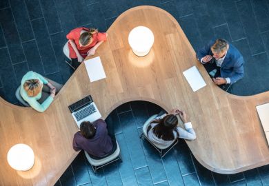 A team of people working together at a university