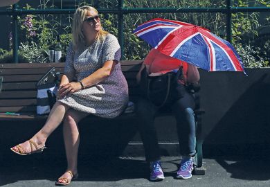 Person with Union Jack umbrella