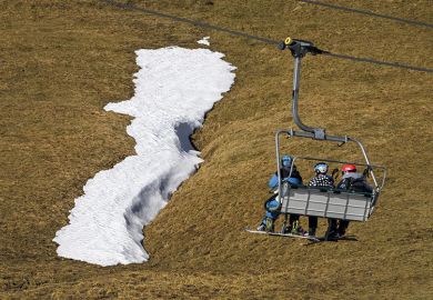 ski lift in a snowless landscape