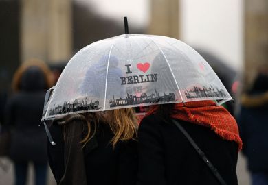 Women under “I love Berlin” umbrella Women under “I love Berlin” umbrella
