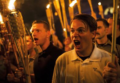 White supremacists march with torches in Charlottesville White supremacists march with torches in Charlottesville