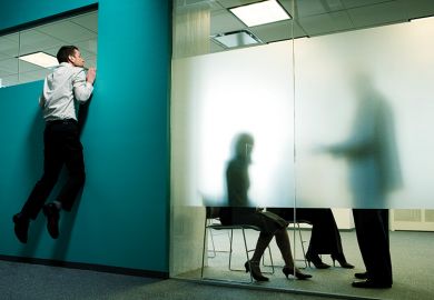 Peeking over the top of a wall