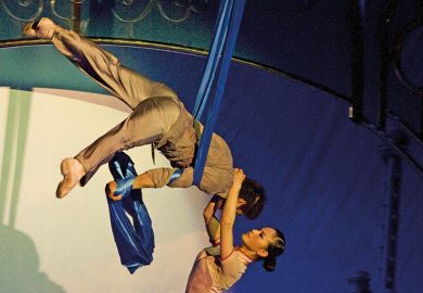 Members of the Shanghai Acrobatic Group performing at the Shanghai Centre Theatre, China Members of the Shanghai Acrobatic Group performing at the Shanghai Centre Theatre, China