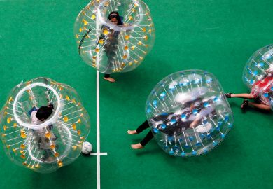 Participants enjoying bubble soccer