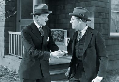 Man offering other man money