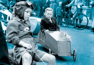 Young competitors make their way to the starting point on an assortment of vehicles. Young competitors make their way to the starting point on an assortment of vehicles.