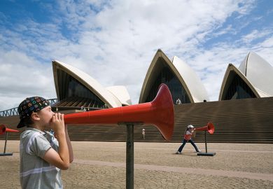 Kids shout through megaphones at the Opera House during the Sydney Festival. Australia