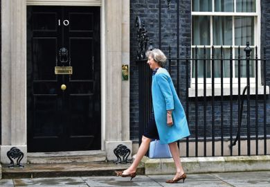 Theresa May entering 10 Downing Street, London
