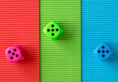 Three coloured dice rolling five