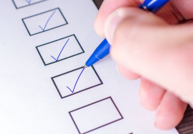 A person ticking boxes